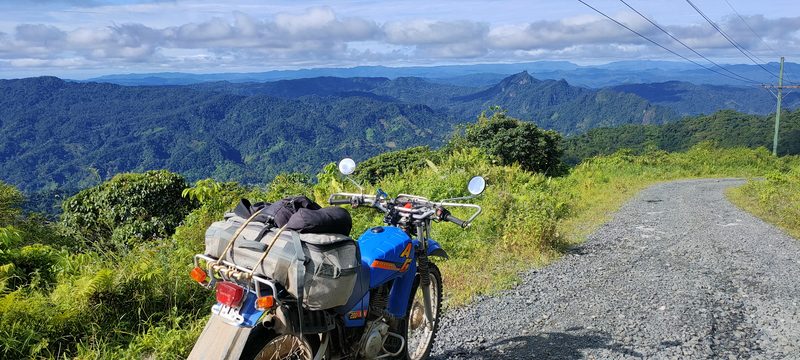 Bike packed for adventure on mountain road