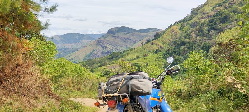 Bike on trail with mountain backdrop